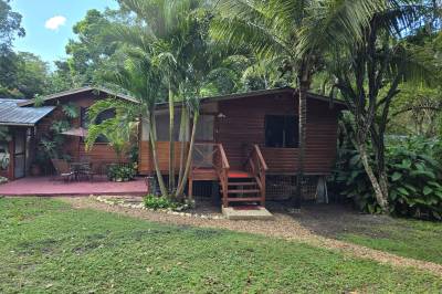 Part of our front entrance and accommodations, Balance Point Wellness Belize, Bullet Tree Falls